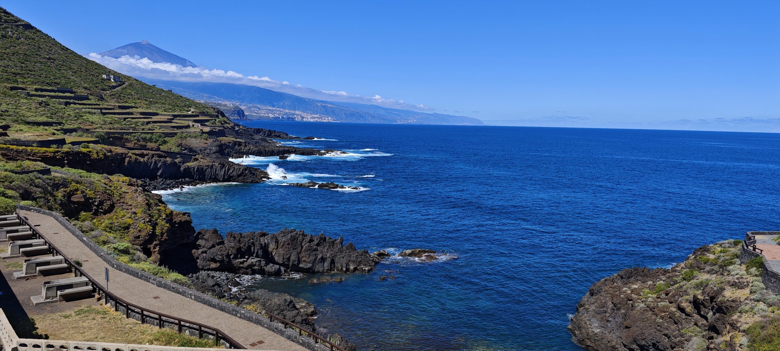 Volcanic coast of El Sauzal with Mount Teide and the Atlantic