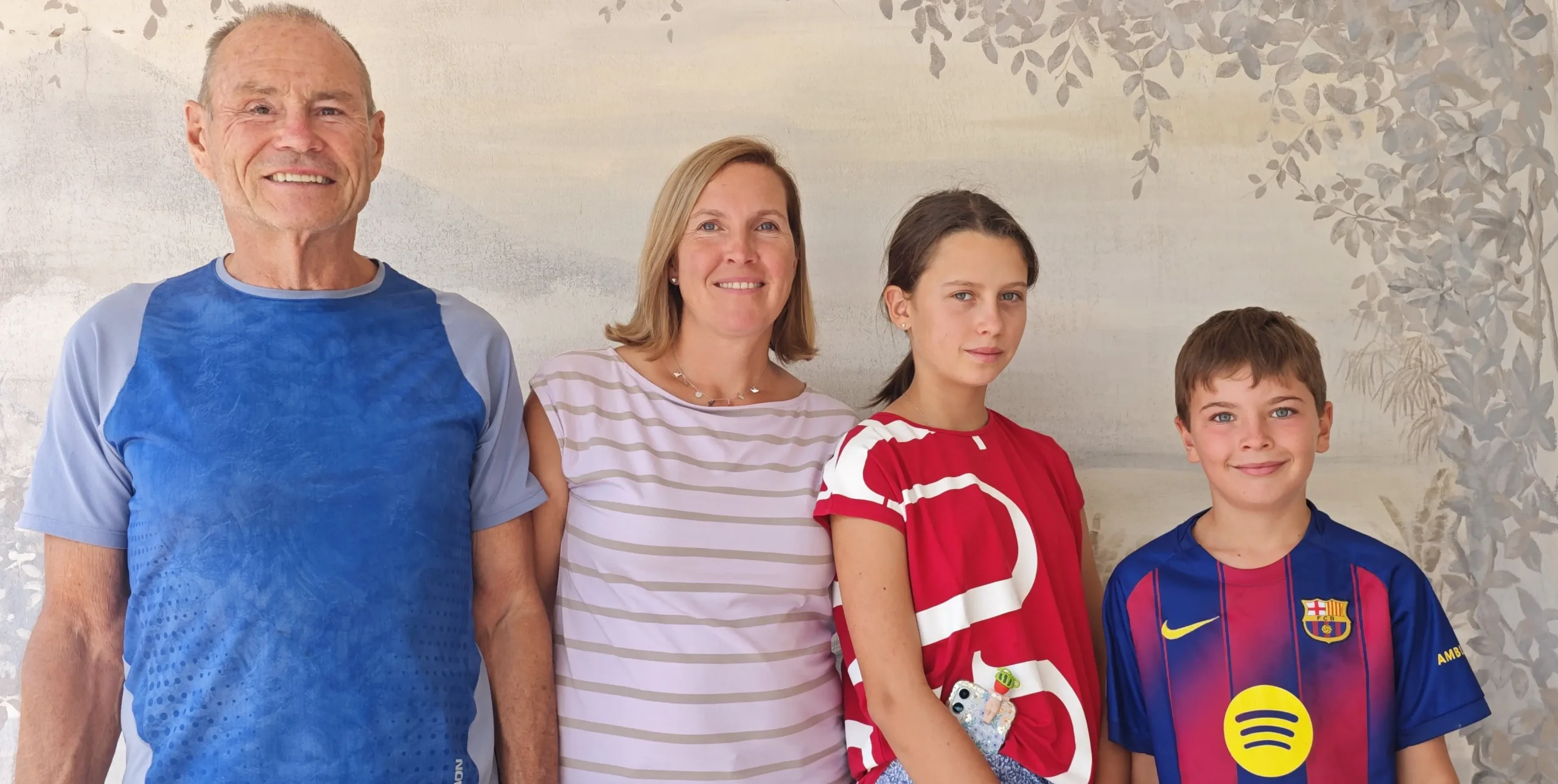Family of four sharing a holiday moment at Villa Larnia